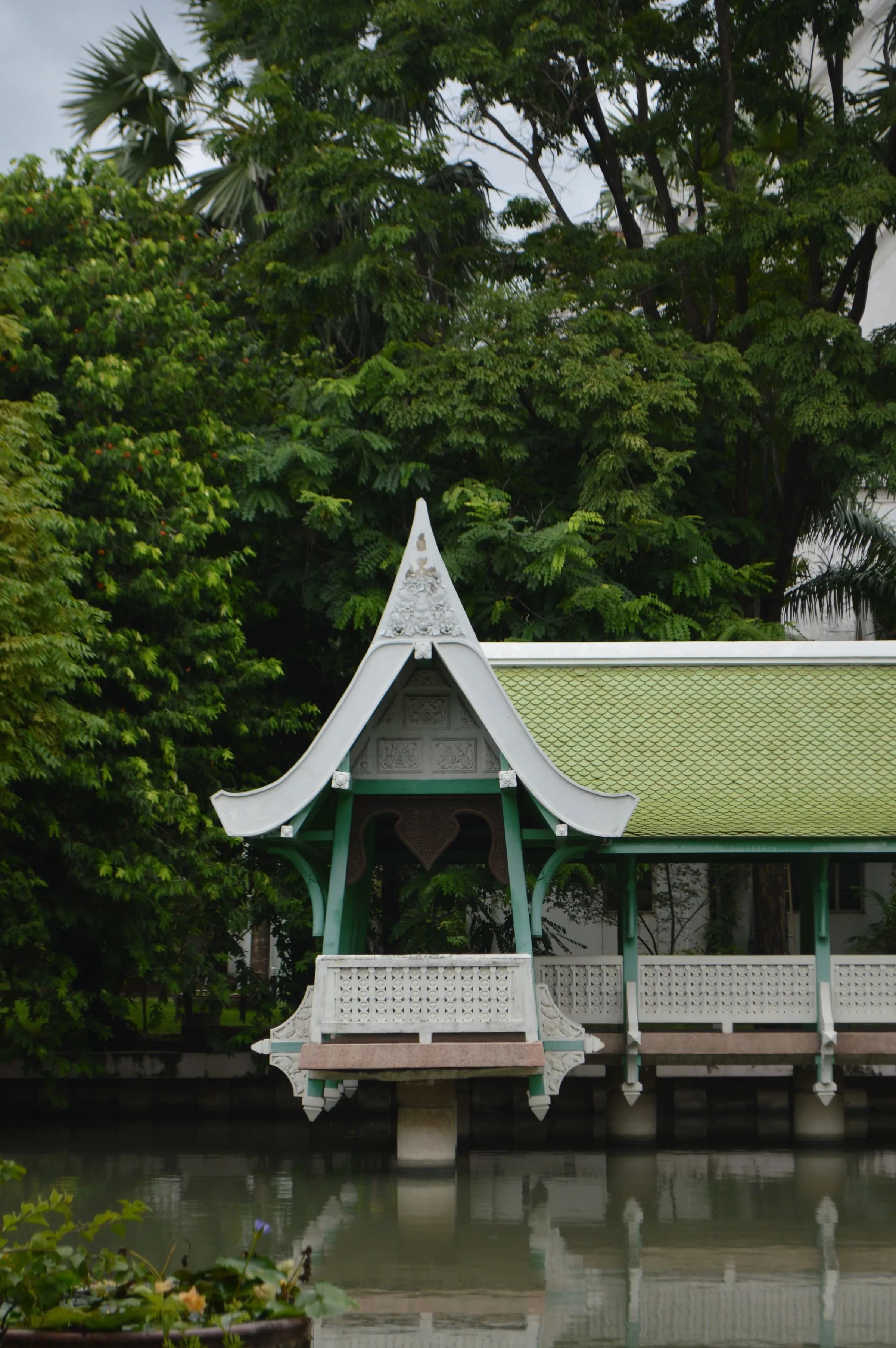 Thai pavilion with a green tiled roof